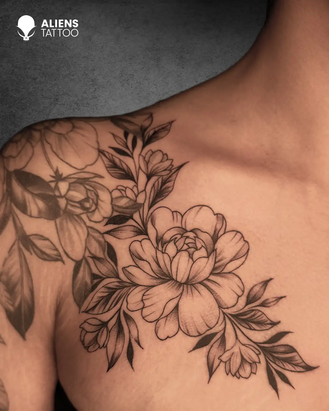 Leaf and flower tattoo