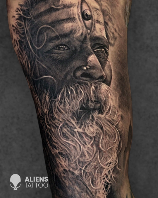Hyper realistic sage portrait tattoo with spiritual depth done at the best tattoo studio in Hyderabad