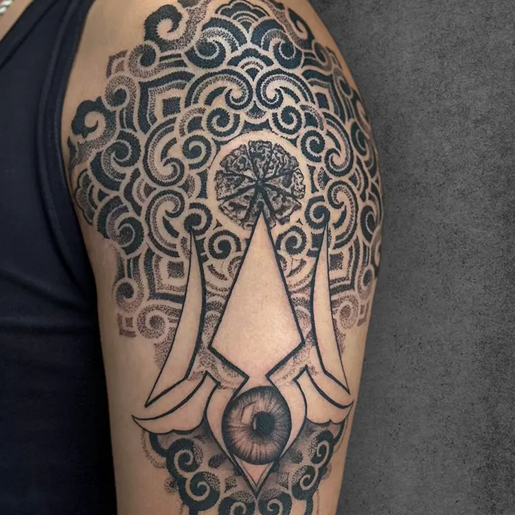 Realistic tattoo with intricate shading by Karan Sharma at Aliens Tattoo