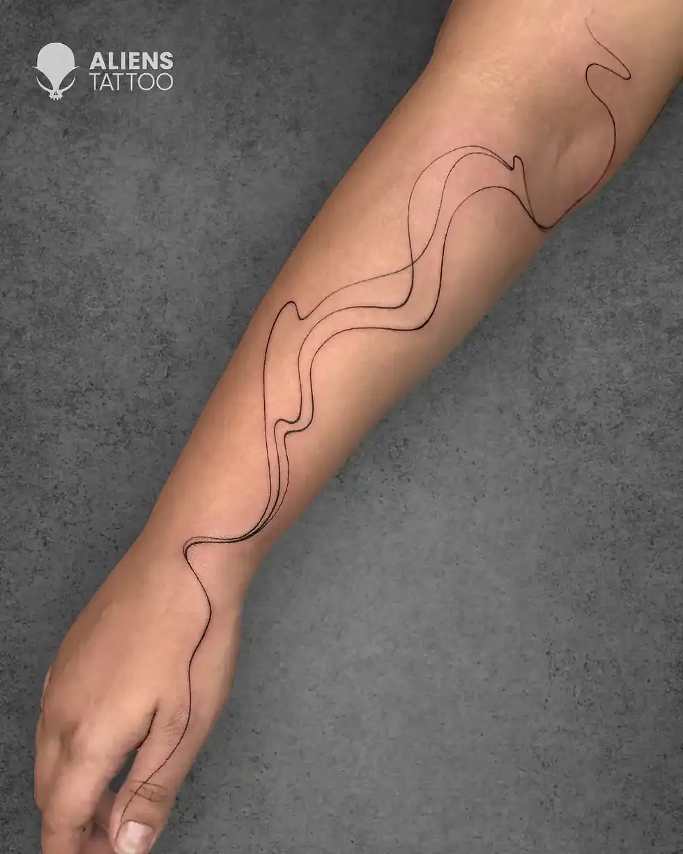 minimalist flowing lines tattoo