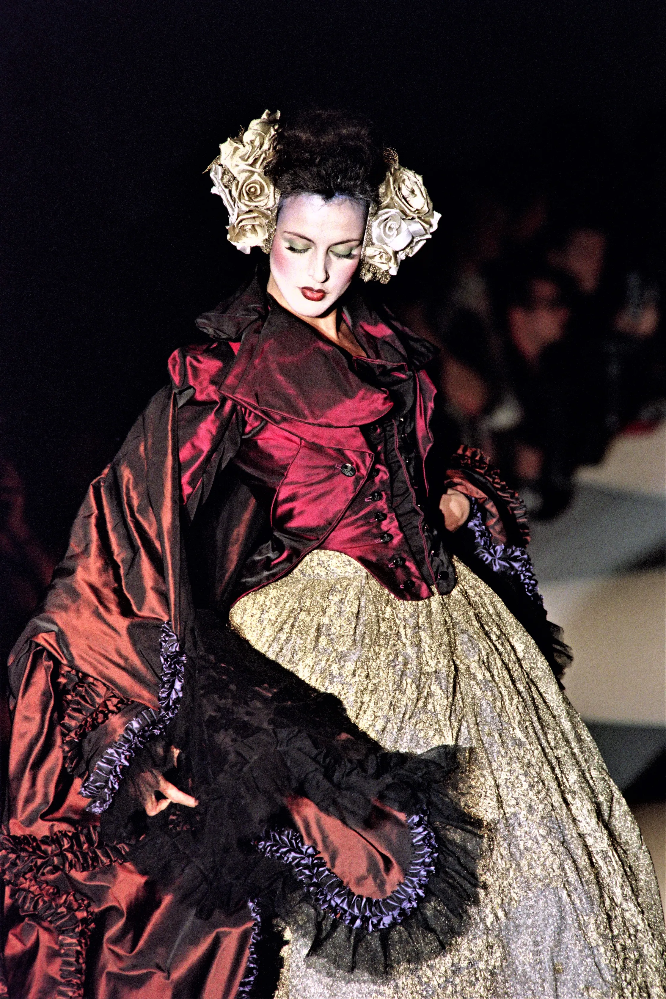 A woman in a French haute couture dress