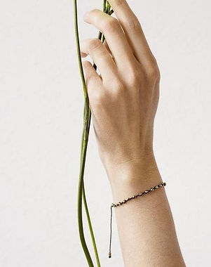 Arm of model wearing Aisha Bracelet