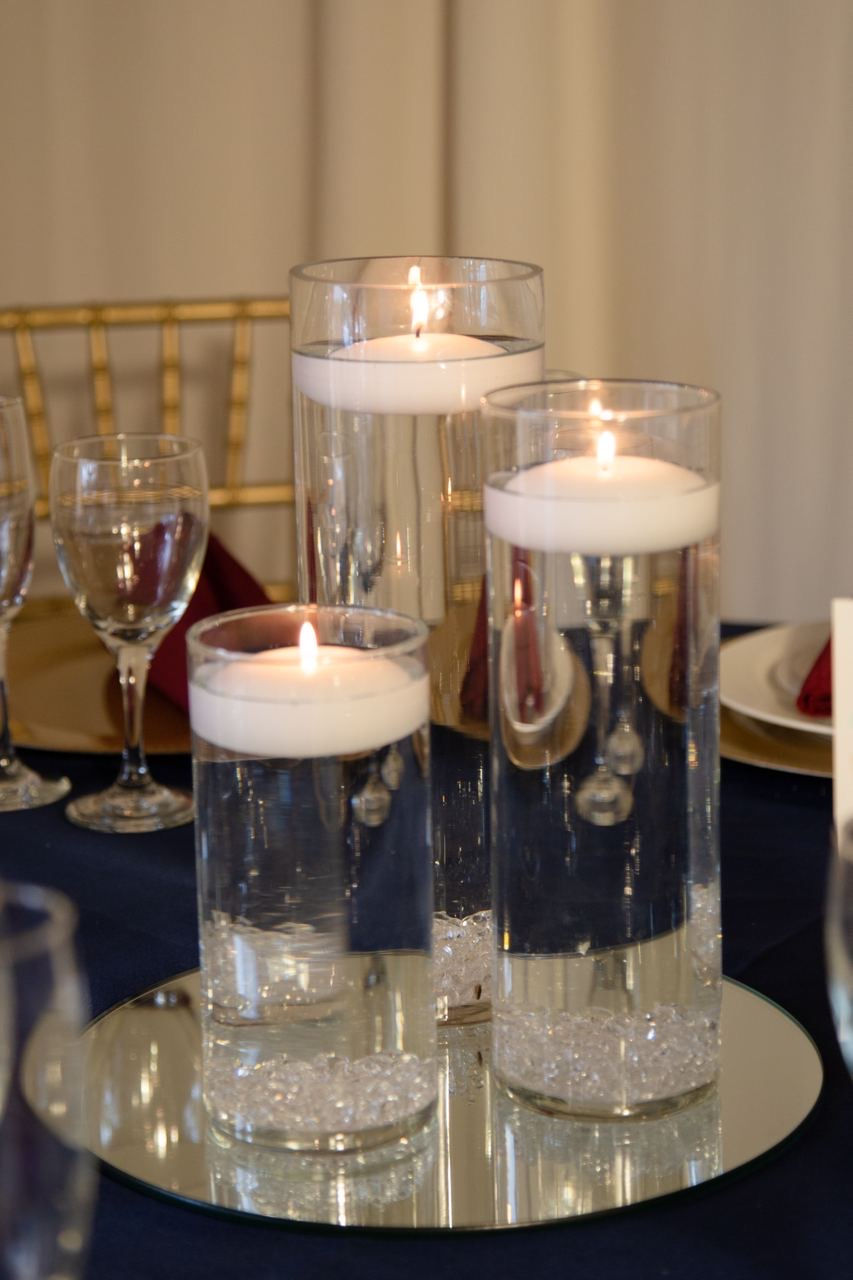 3 Cylinder Vase With Floating Candles Centerpiece