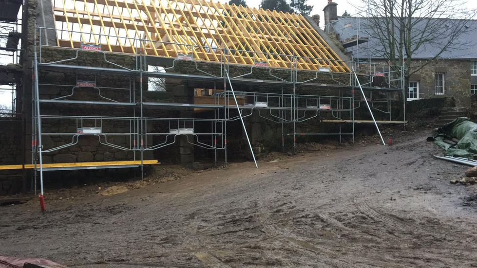 Photo de rénovation d'une grange transformée en maison d'habitation en Basse-Normandie
