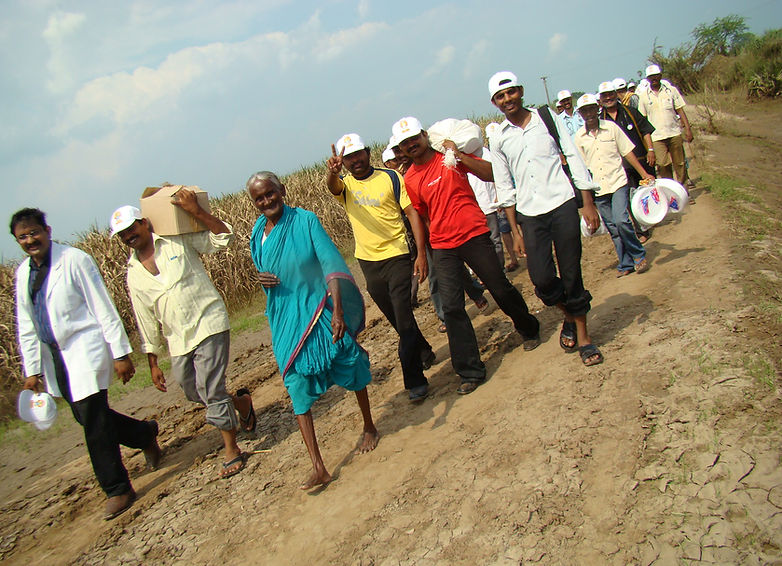 Dr.Kiran Nandivada with his trusted friends and volunteers during a relief operation.