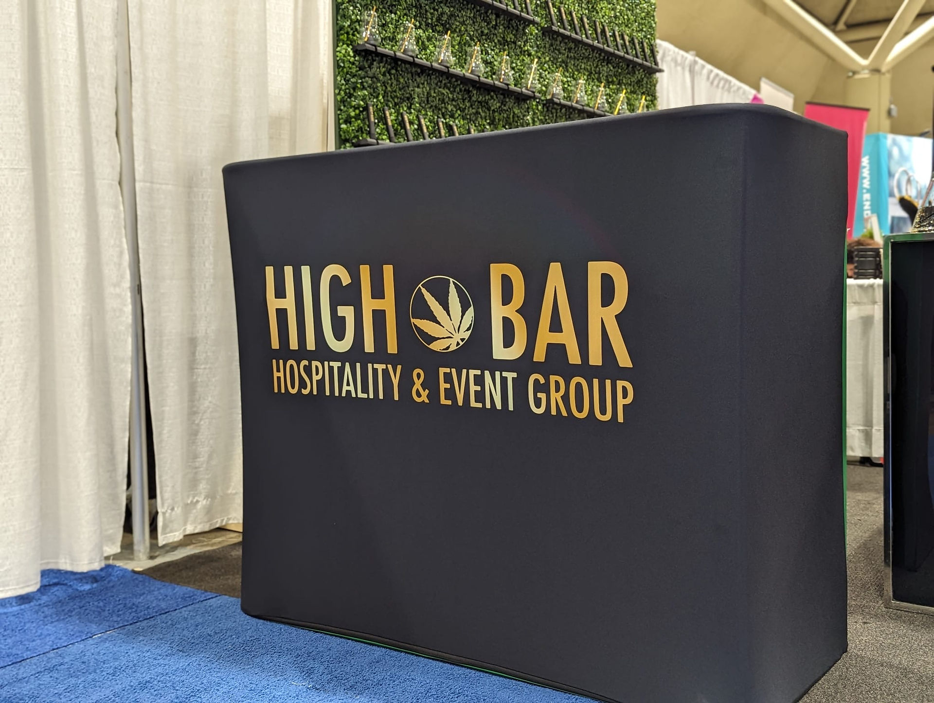 As a host, it is essential to consider the diverse preferences of your guests. In addition to serving alcohol, we encourage you to offer cannabis as an alternative option, be it through smoke, vapor, or infused beverages. Surprisingly, approximately 70% of event attendees express a desire to explore cannabis or at least experience it within the event setting. By embracing this inclusive approach, you not only demonstrate your exceptional hosting skills but also ensure that every guest feels valued and well-cared for.  We firmly believe that a truly outstanding event leaves no room for guests to bring their own cannabis. Just as we wouldn't expect guests to bring their own alcohol, it is our responsibility as hosts to provide a comprehensive and tailored cannabis experience. Let us ensure that your event surpasses all expectations.  HIGH BAR Hospitality & Event Group proudly stands as Canada's premier luxury mobile cannabis bar, offering an unparalleled array of services. From cannabis sommeliers to knowledgeable budtenders, on-site infusing to comfortable consumption lounges, and cannabis catering to other bespoke hospitality offerings, we provide a holistic and sophisticated experience for all. Regardless of whether you are a newcomer to the world of cannabis or a seasoned connoisseur, our services cater to every individual's needs.  With over 25 years of expertise within the event industry, we seized the perfect opportunity presented by the advent of legal cannabis. This allowed us to establish a high-class event company that seamlessly integrates cannabis in its myriad of wonderful forms. Our mission is simple yet profound: to provide clients with an elevated cannabis experience presented in the most classy and sophisticated fashion. To achieve this, we have forged alliances with the industry's finest names, ensuring that we deliver the highest quality service for any occasion. Our unwavering dedication to cannabis education, safety, and providing a responsible experience underscores our commitment to excellence.  Join us as we redefine the boundaries of the event industry, hospitality, and the vibrant cannabis community. Let us together create unforgettable celebrations, where event design, decor, and wedding planning merge harmoniously with the world of cannabis.