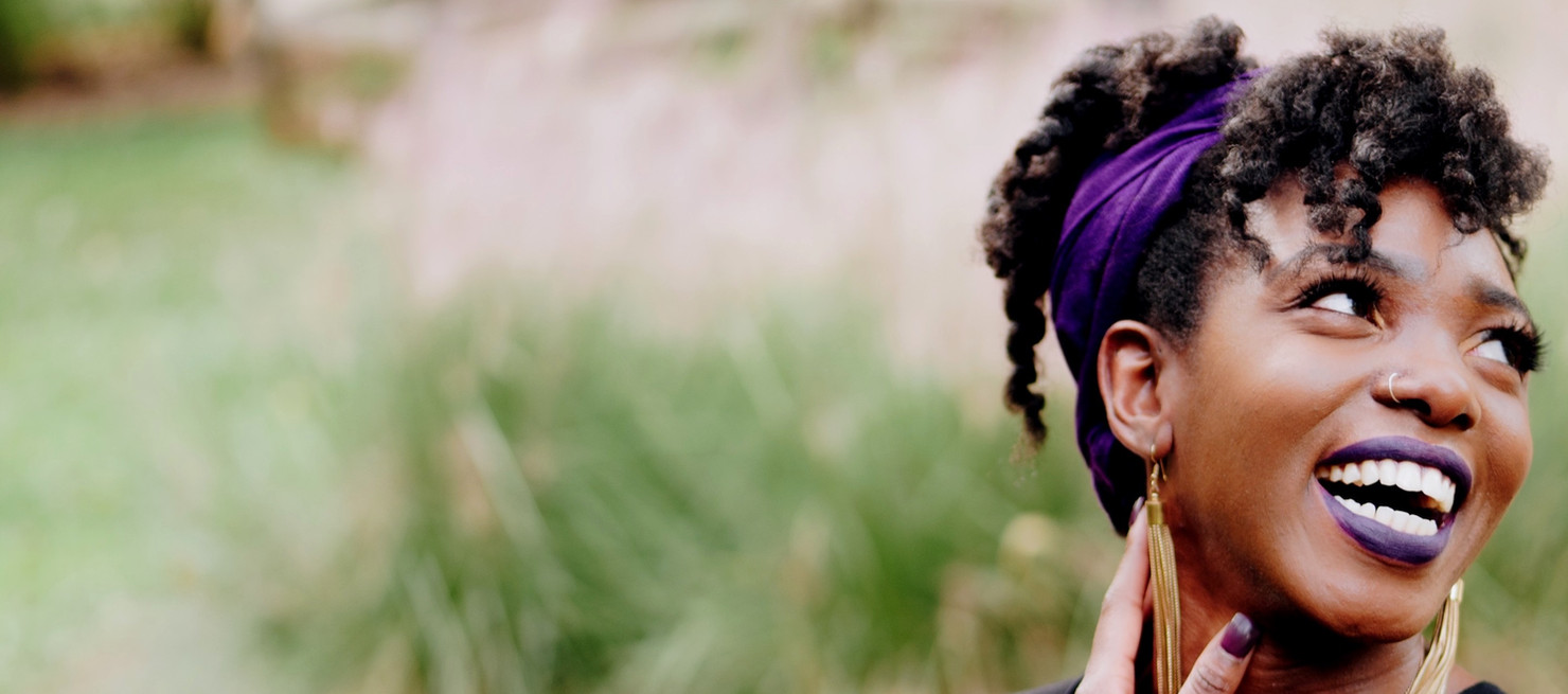 photo of woman wearing purple lipstick and black crew-neck shirt_edited.jpg