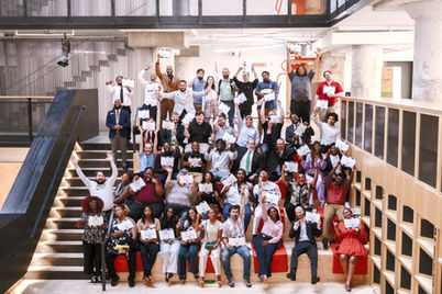 Graduates of adult career training in Memphis celebrating.