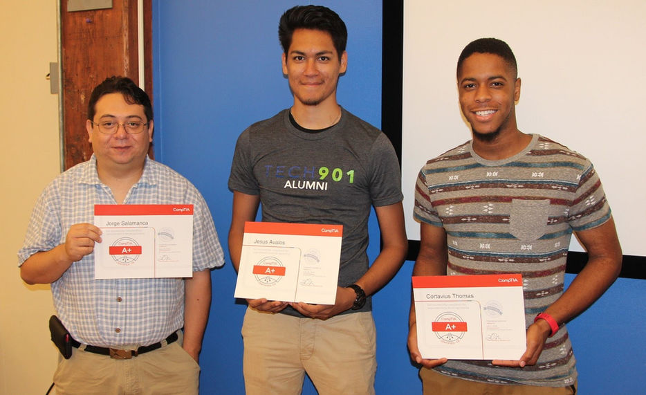 Students holding certificates at IT Training Memphis.