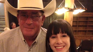 Tim's youth client winning her buckle, 2015