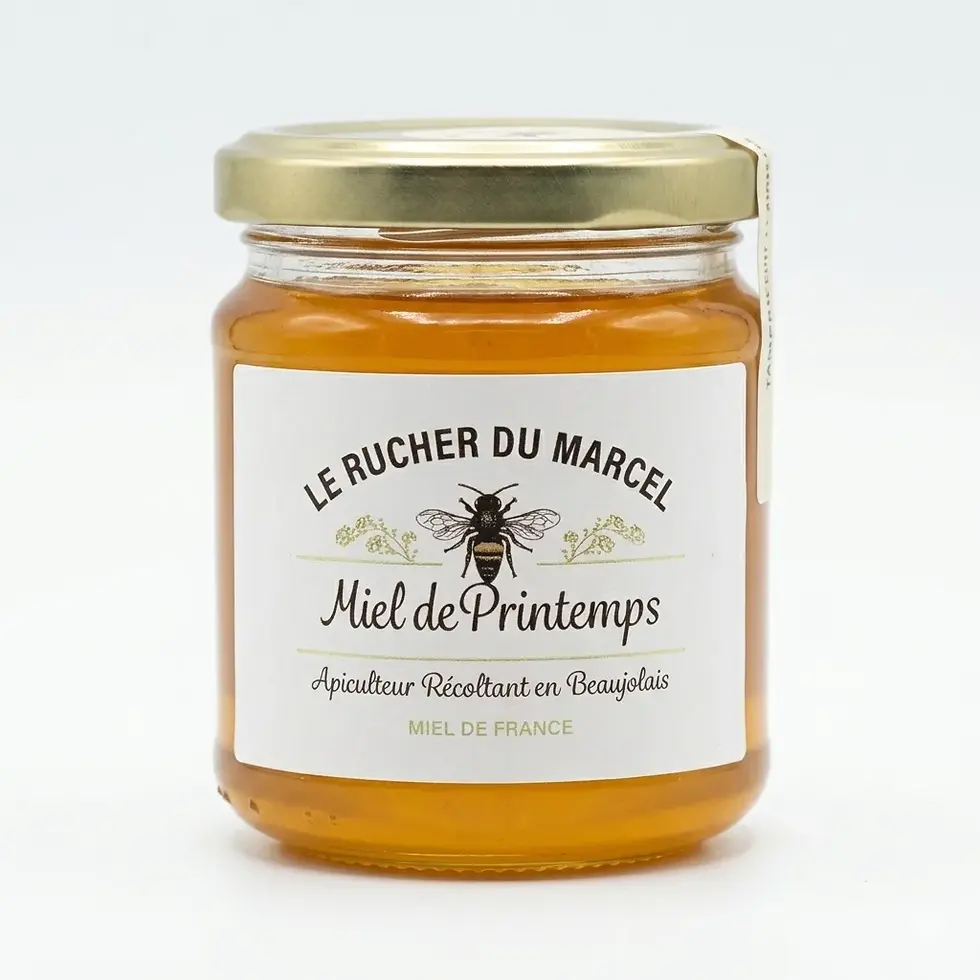 Pot de miel de printemps sur fond blanc