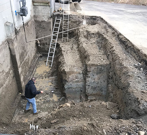 An excavation to prepare for a new foundation.