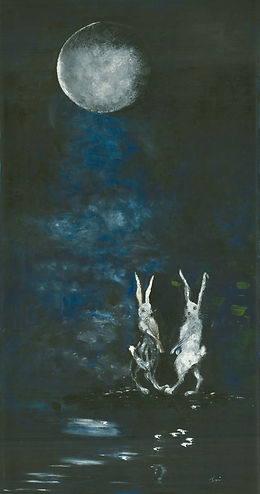 Startled hares boxing in the moonlight