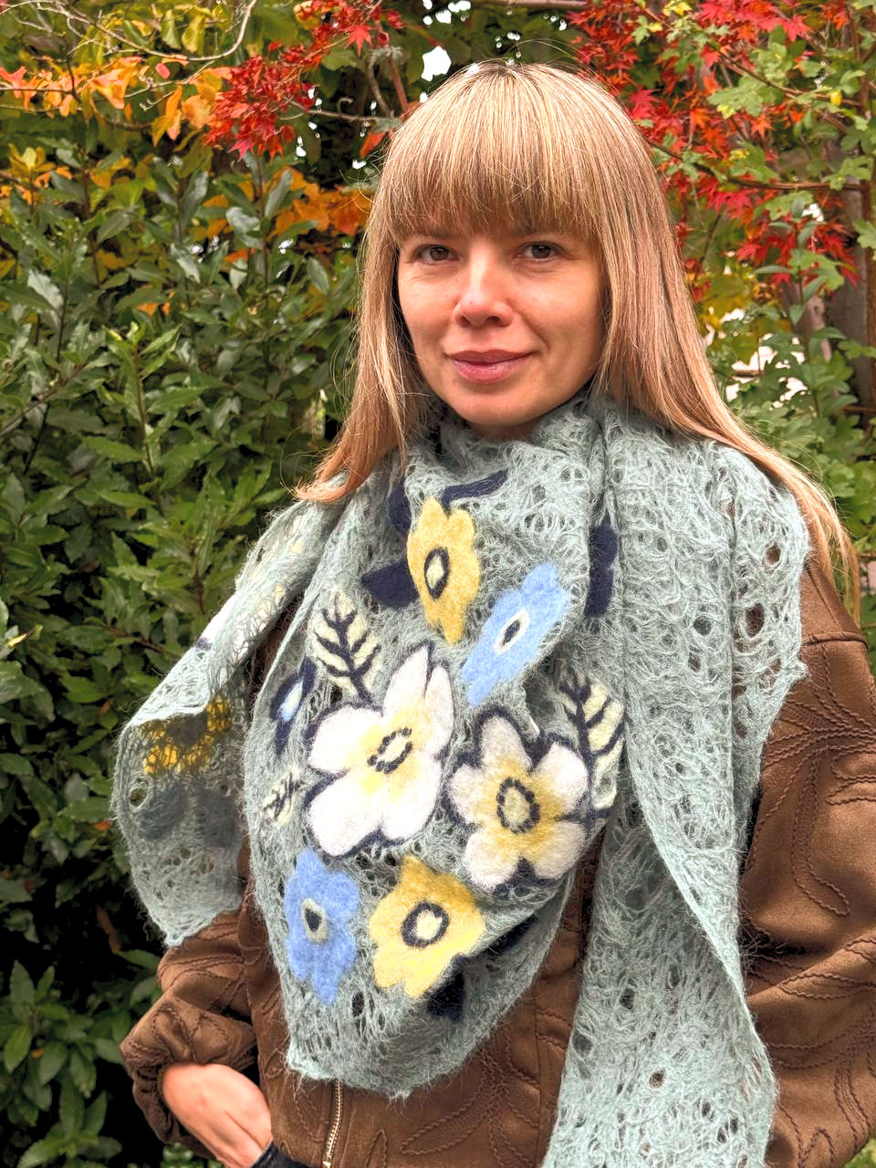 Sage green triangle mohair scarf with felted blue and yellow flowers