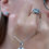 Miniature : silver retro style earrings ring and necklace natural topaz close up