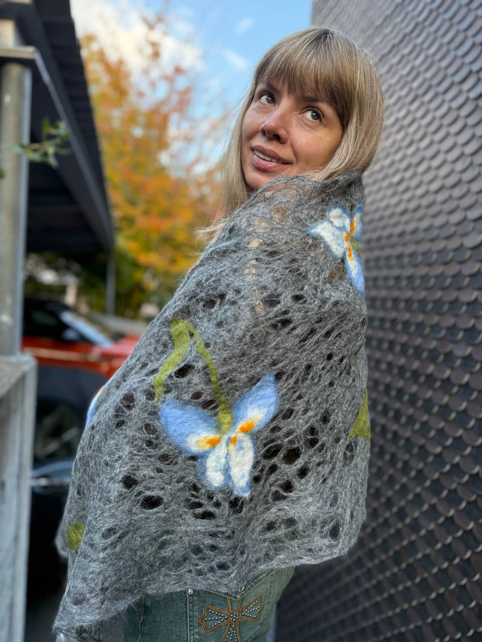 Grey rectangle mohair scarf with felted blue flowers side view