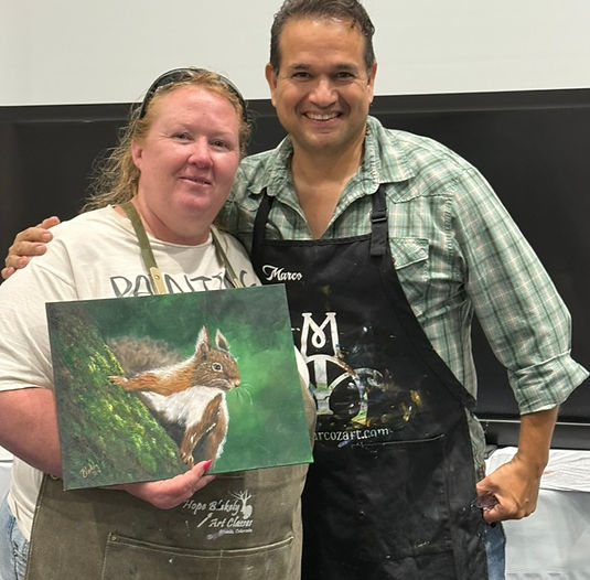 Night Wolf, a moonlit white wolf painting by Hope Blakely, painted at the 2025 Oklahoma City Painting Palooza with Marco Aguilar. The dark night scene makes the wolf appear illuminated by moonlight.