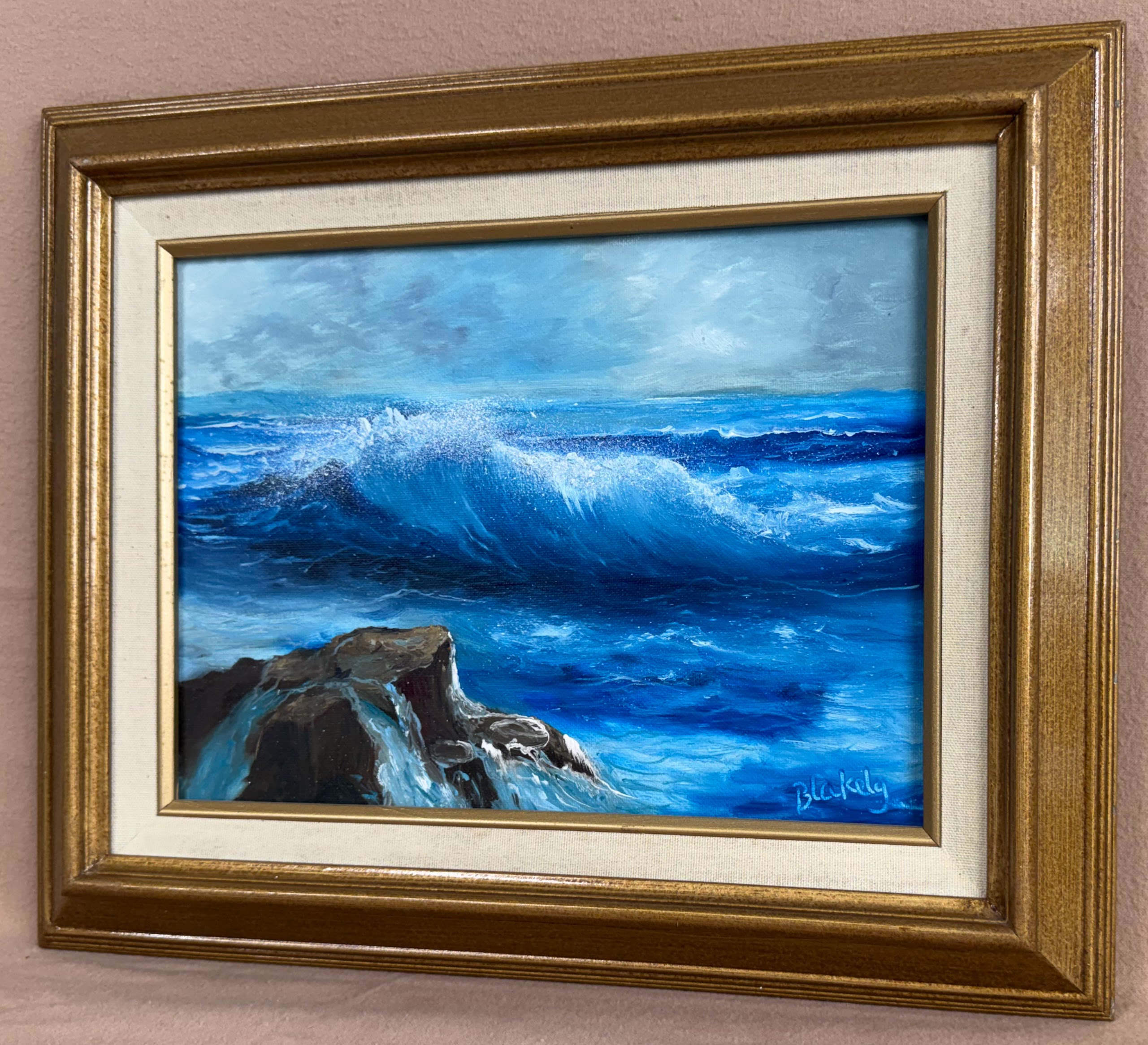 A seascape painting of a breaking wave