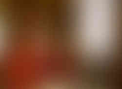 Diane André standing warmly beside a blank canvas outdoors, introducing a new painting lesson with her signature calm, encouraging presence.