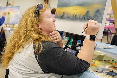 Hope Blakely painting a side project during a Steve Ross workshop, based on a morning view from the campground in Winchester, Indiana. The finished painting was given to campground owners John and Missy.