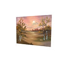 Warm autumn landscape with birch trees and soft metallic highlights in the sky