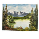 A tranquil nature painting showing distant mountains, glowing water, and rich forest details in the foreground