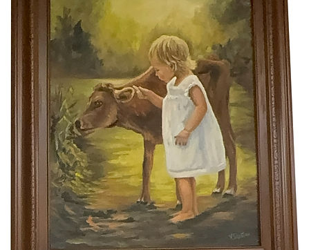 A little girl and her cow