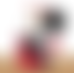 Man sitting in a chair browsing his phone making an enquiry