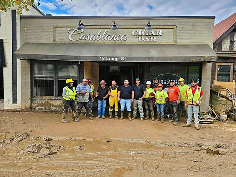 group of workers in front of Biltmore Village location