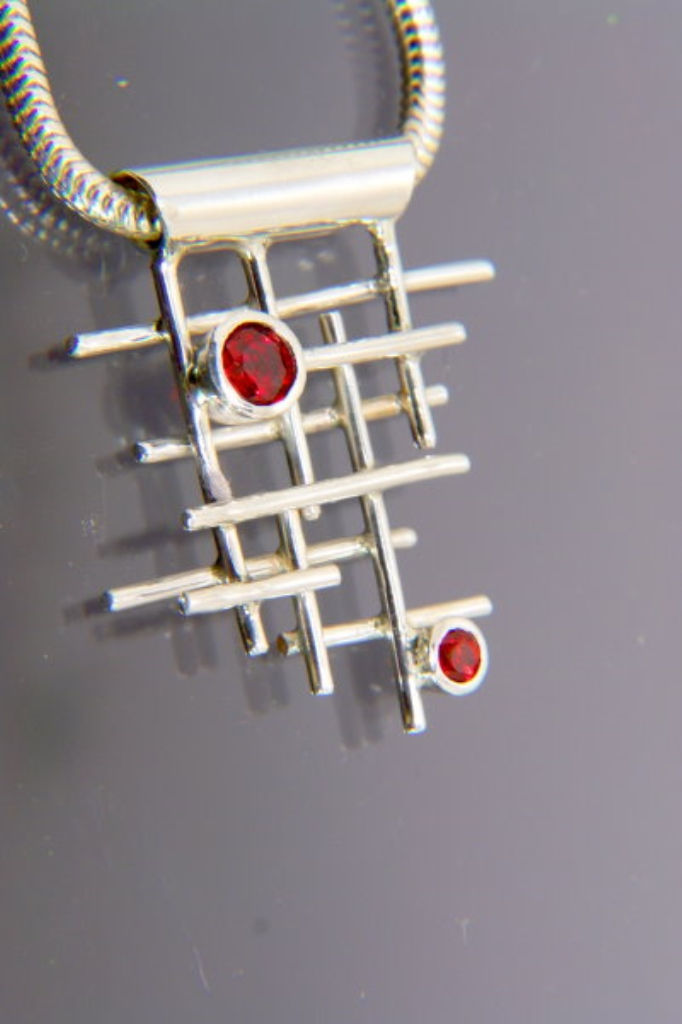 Sterling Silver Pendant with Red Sap