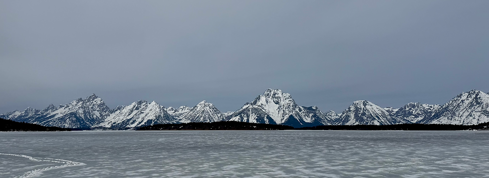 The lake was still covered in ice, not thick enough to walk on, but ice just the same.