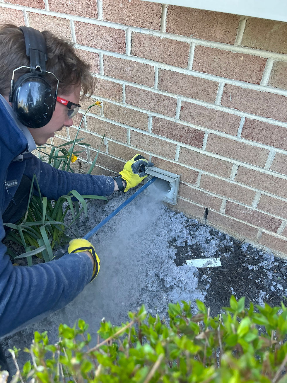 Zach extracting lint from dryer vent