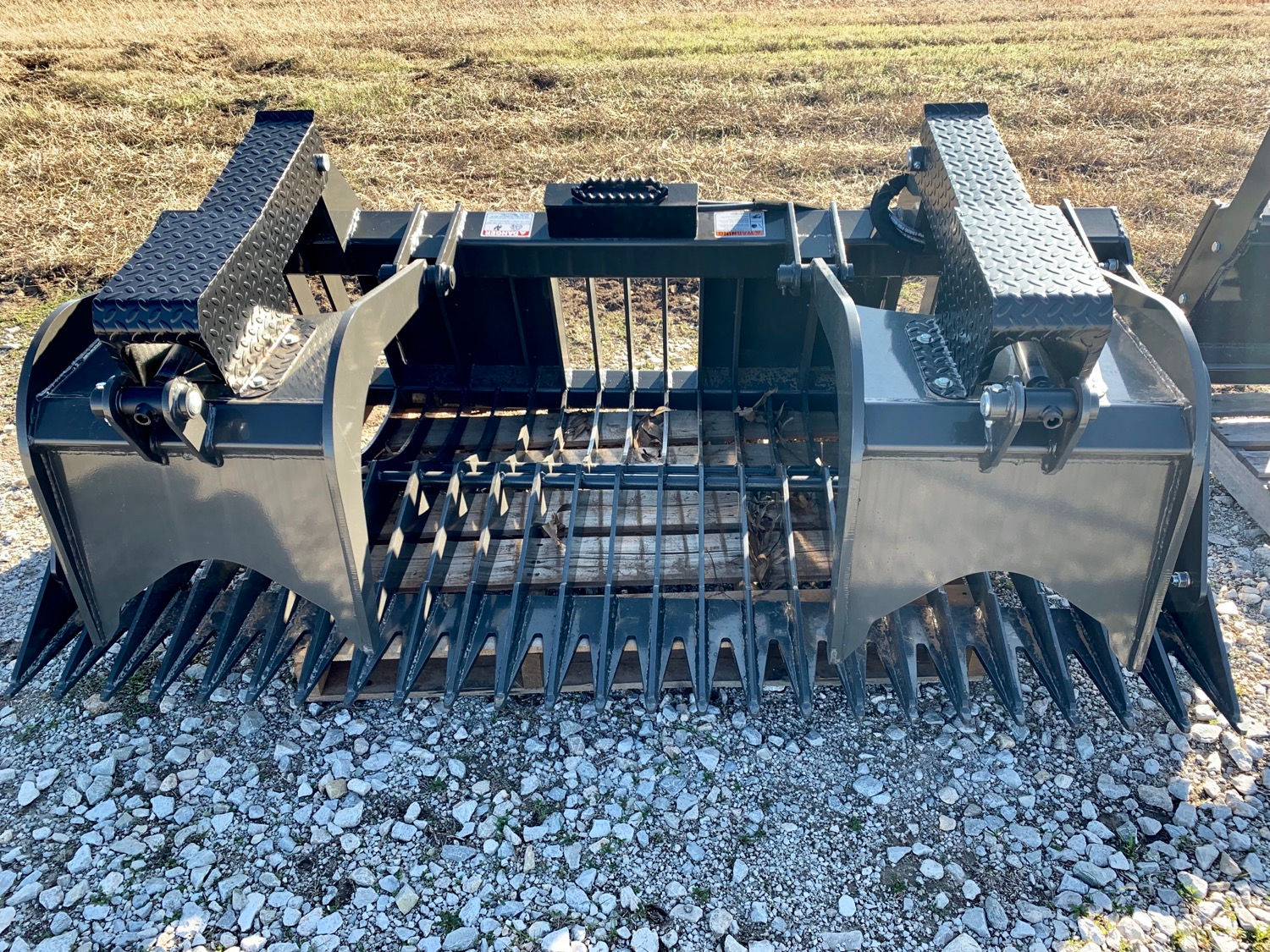 Skid Steer Rock Grapple - Xtreme Duty by CID Attachments 