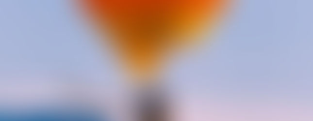 Close up of people in theZigzag Hot Air Balloon floating in the sky- Spirit of Boise