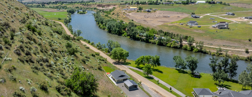 Wide Aerial drone Airbnb Photo showcasing the surrounding area