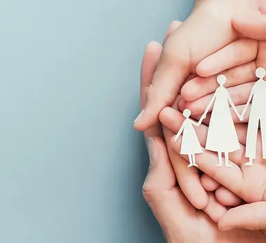 Family in hands.webp
