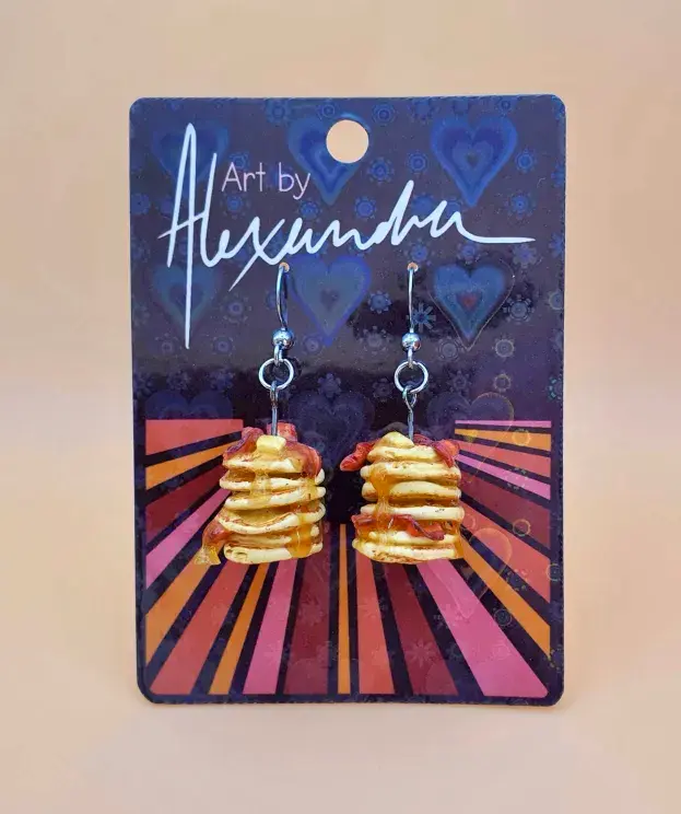 Thumbnail: Pancake stack earrings displayed on a  backing card which reads Art by Alexandra.