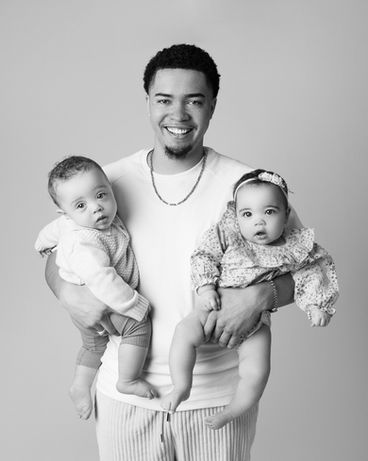 Dad photo shoot with his twin babies