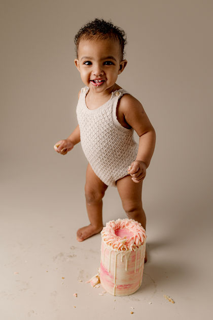 Baby girl neutral themed cake smash with pink cake