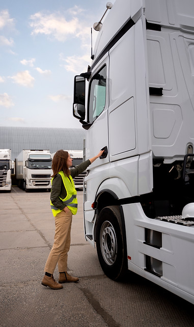 full-shot-woman-fixing-truck.jpg