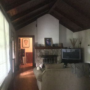 This dark living room area needed life and sunshine. This home has gorgeous original 1930 installed real mahogany ceiling beams that was not highlighted, nor even seen in this home.