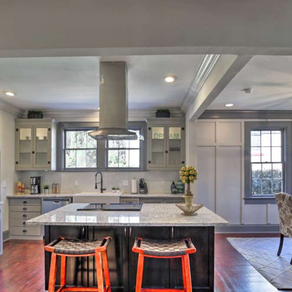 This home is now open to the kitchen, dining room and living area.