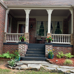 Brighter, Fresher look! Painted railing lighter color and used black paint on porch and stairs to bring out the beauty of the red brick and light rails