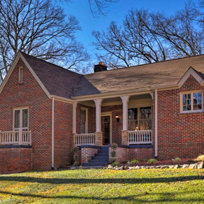 Now...this exterior home is Beautiful. Vertical columns, railing were replaced and porch upgraded.