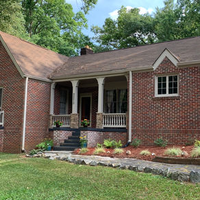 Added stack stone to columns, pressure washed brick, replaced moulder between bricks.