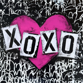 Mixed-media artwork featuring a bold hot pink heart with distressed black-and-white typography spelling ‘XOXO’ – part of the Love Series by Cleveland artist, Ingrid Hoegner