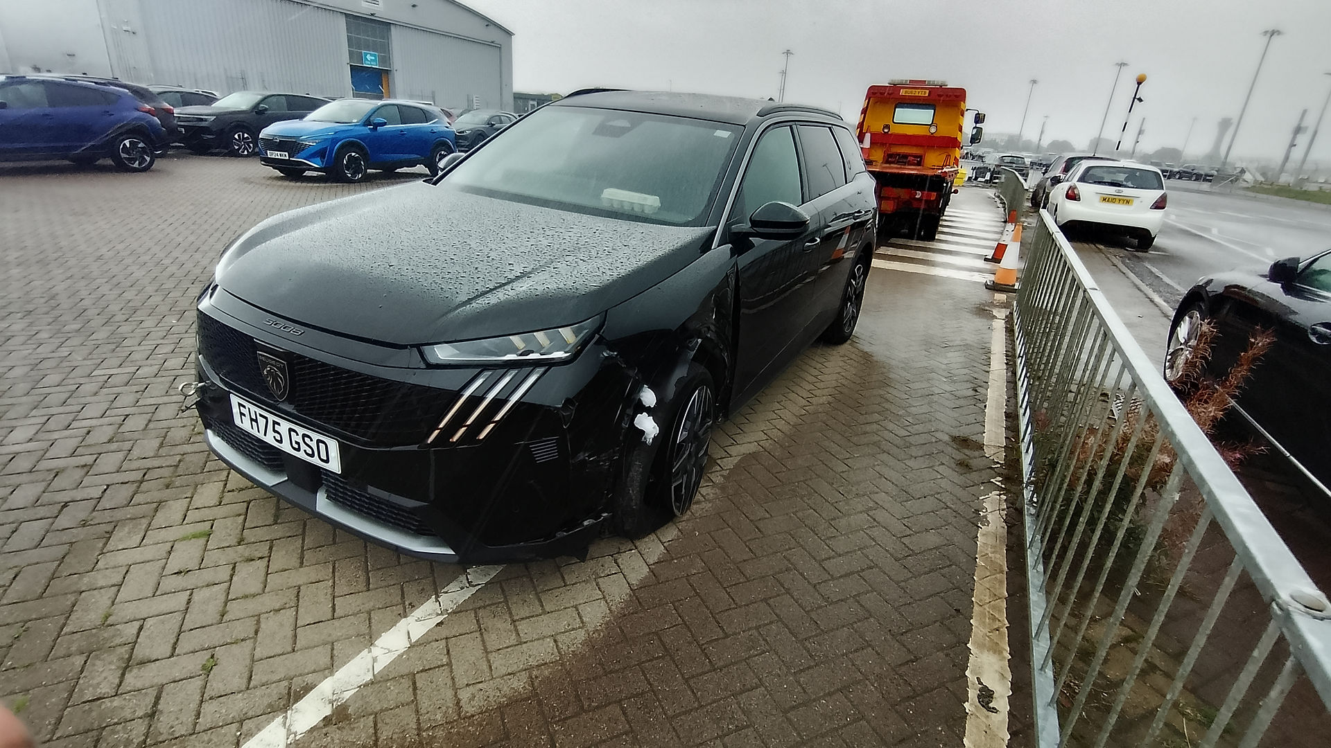Peugeot 5008 being transported by Falkirk Recovery in Edinburgh