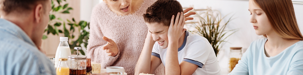 teenage boy feeling overwhelmed by sensory issues
