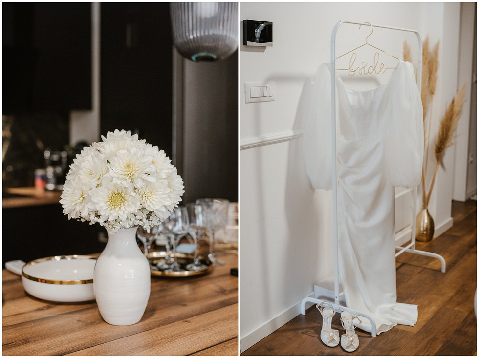 Vjenčani buket bijelih cvjetova u bijeloj vazi na drvenom stolu i vjenčanica s puf rukavima na stalku s natpisom "bride", uz Jimmy Choo sandale ispod haljine