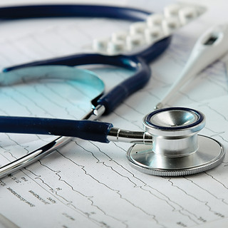 Stethoscope on the Cardiogram